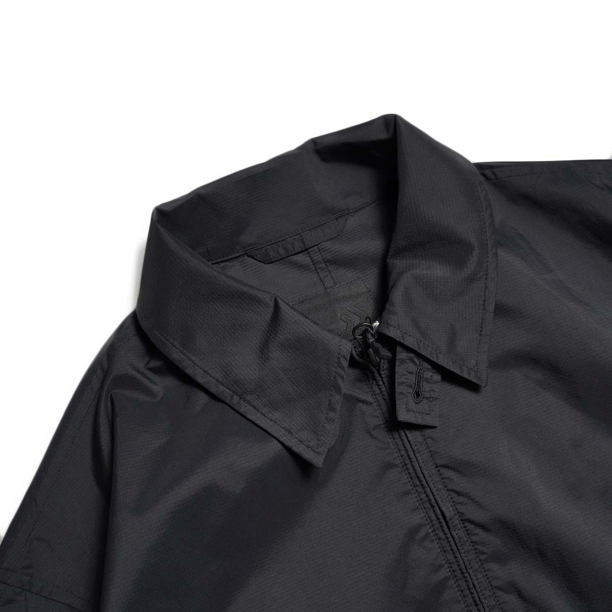 DAIWA PIER39 / TECH PERTEX® TRAVEL SPORTS JACKET (Black)