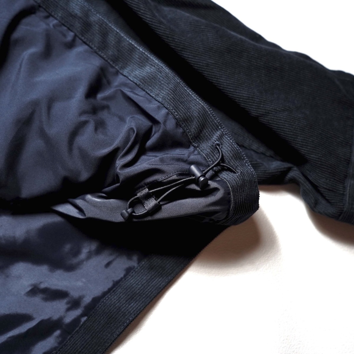 DAIWA PIER39 / TECH WADING JACKET CORDUROY (D.Navy) 裾スピンドル