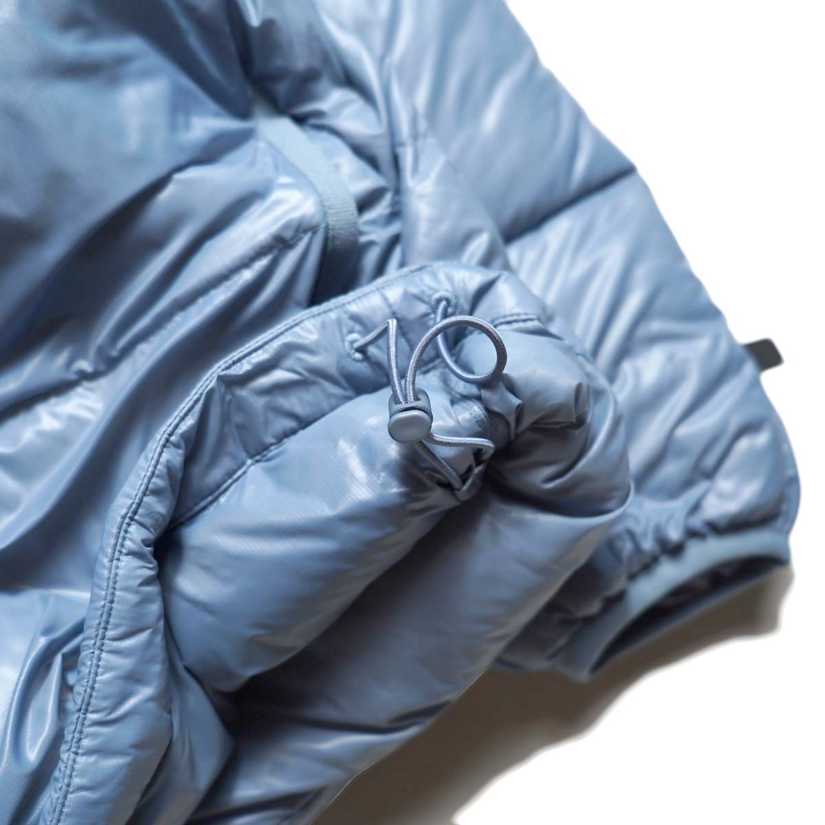 DAIWA PIER39 / W's TECH ULTRA LIGHT DOWN JACKET (LT.Blue) 裾コード