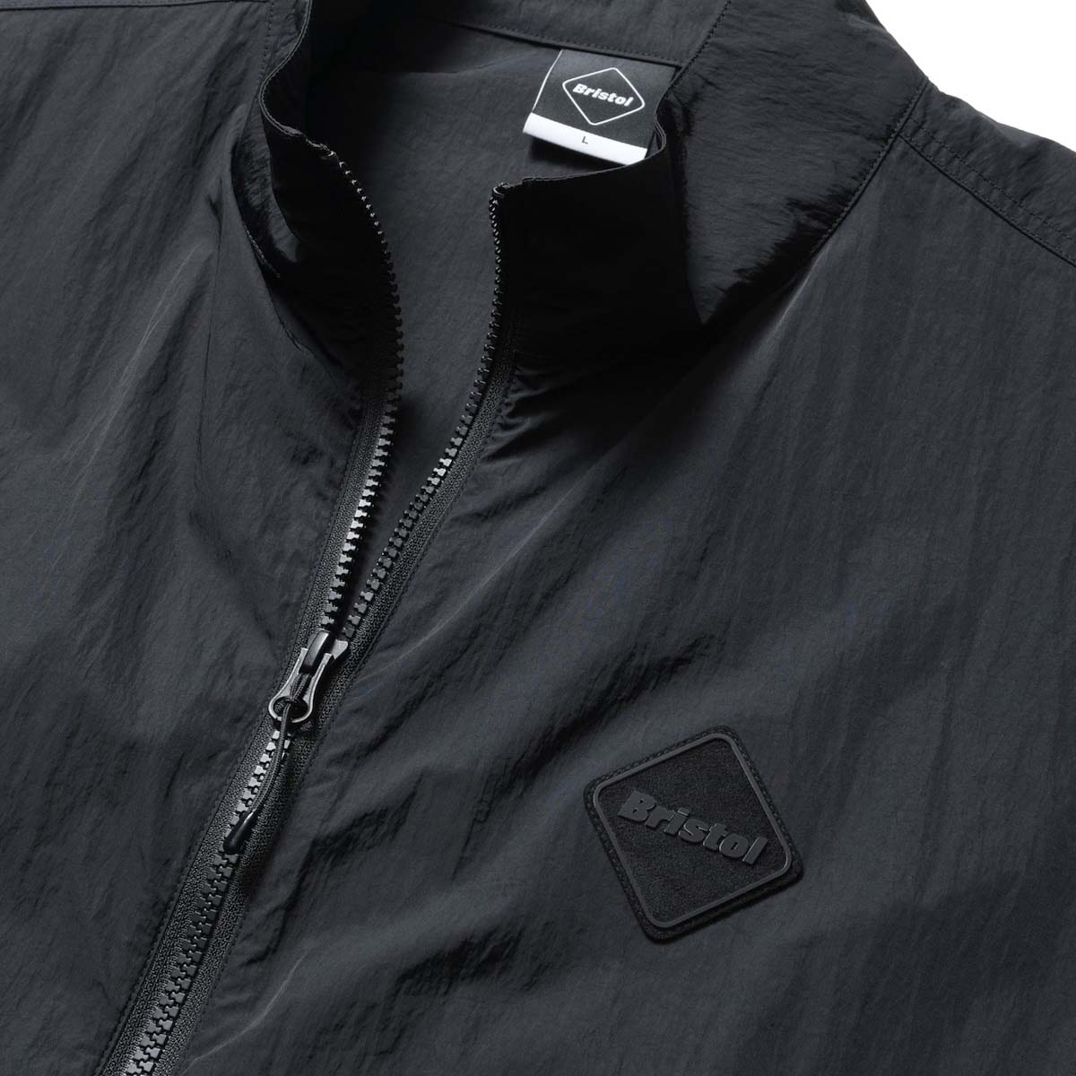 F.C.Real Bristol / BIG LOGO NYLON STAND COLLAR BLOUSON (Black)