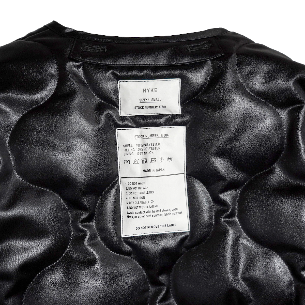HYKE / FAUX LEATHER QUILTED JACKET (Black) タグ