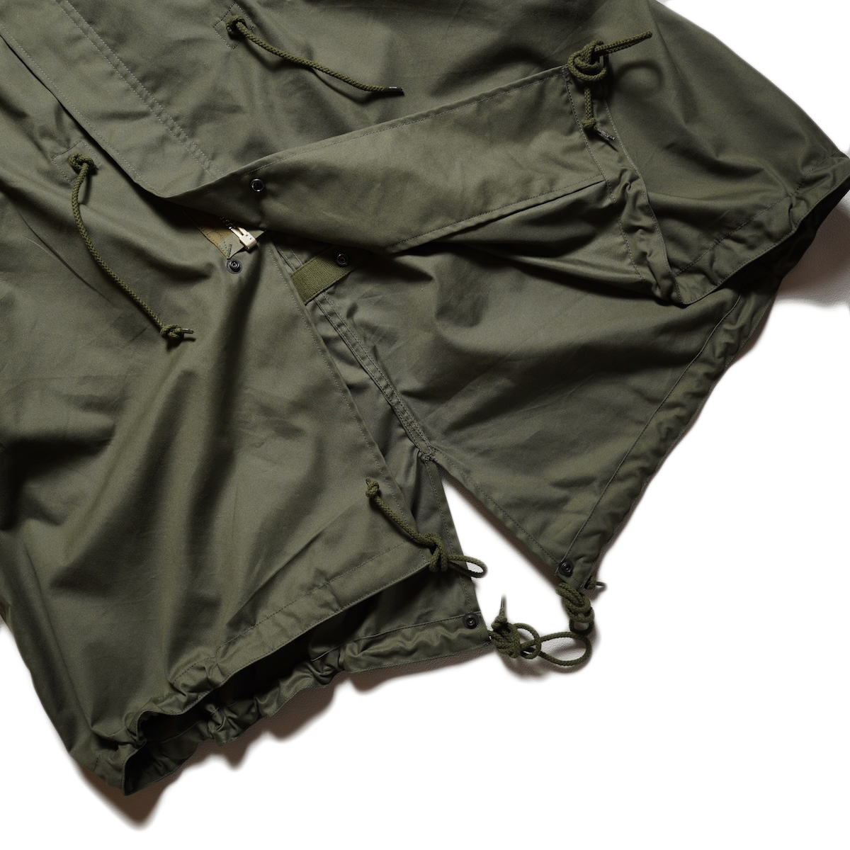 HYKE / N/C TYPE M-48 FIELD COAT (Olive Drab) 裾