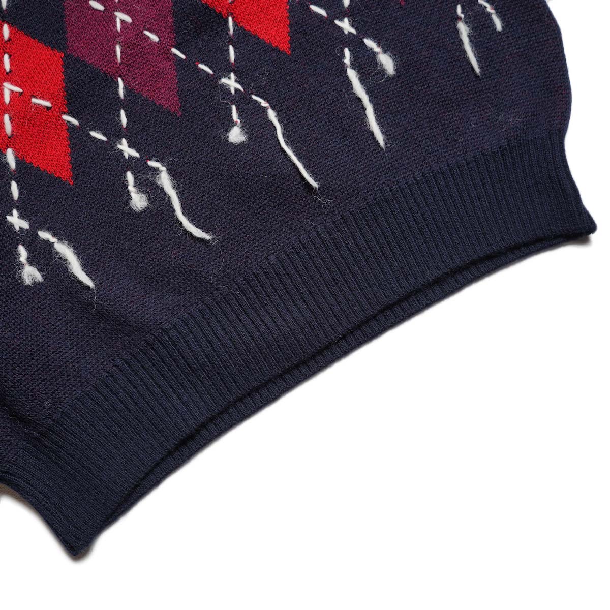 JANE SMITH / 7G DOUBLE JACQUARD ARGYLE V NECK SWEATER (Navy) 裾