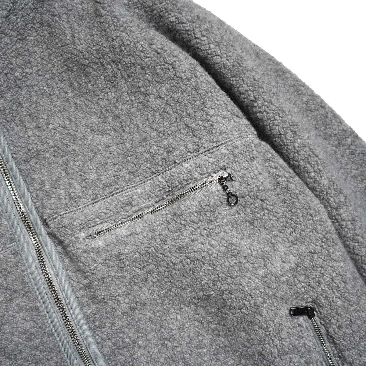 nonnative / HIKER FULL ZIP BROUSON WOOL POLY NYLON PILE (H.Gray) 胸ポケット