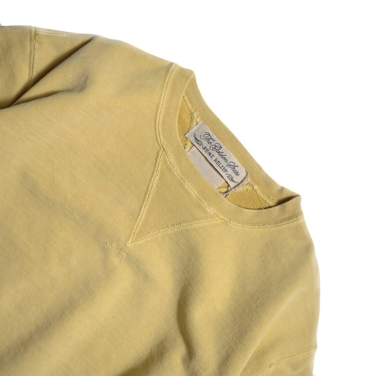 REMI RELIEF / SP加工裏毛クルー (Yellow) ネック