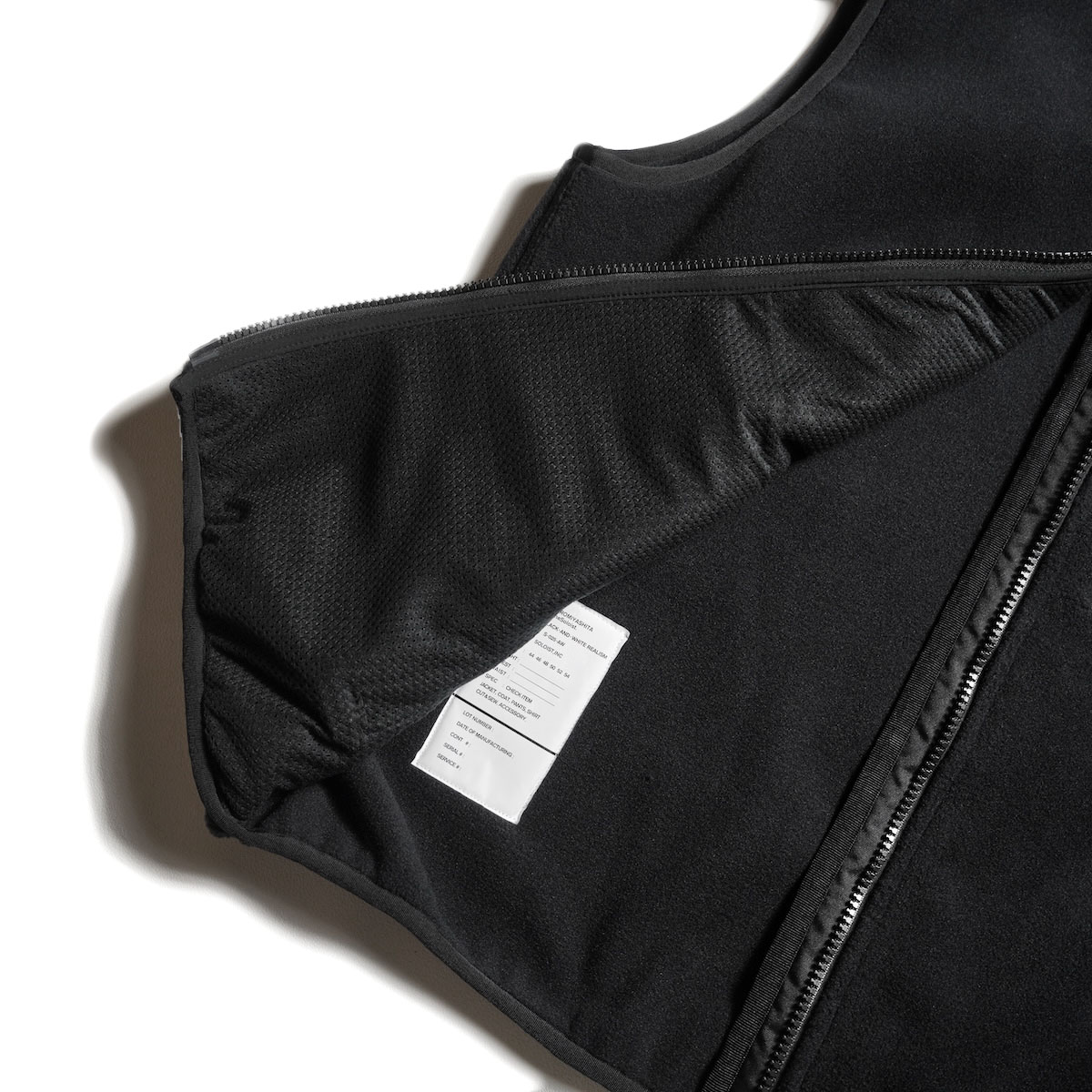The Soloist / sc0004AW25 stand collar zip up vest. (Black)